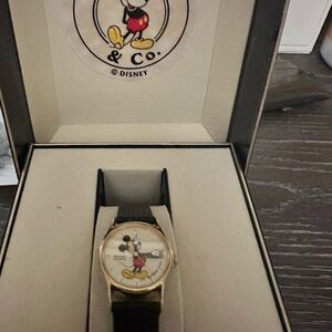 Seiko Disney Women's Watch with Black Strap and Gold Accents